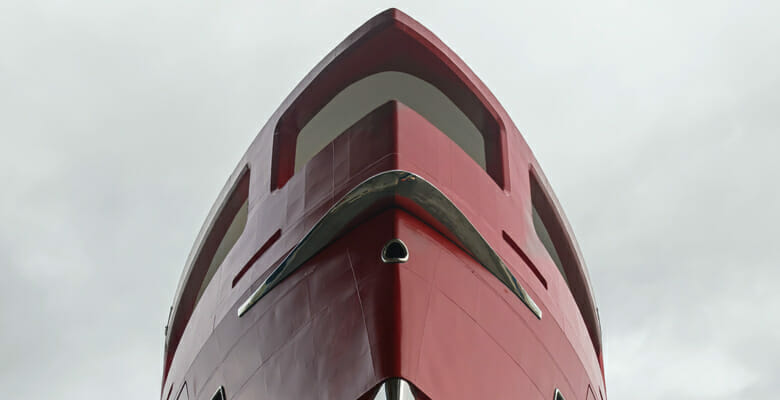 the Rossinavi yacht Akula has a red hull